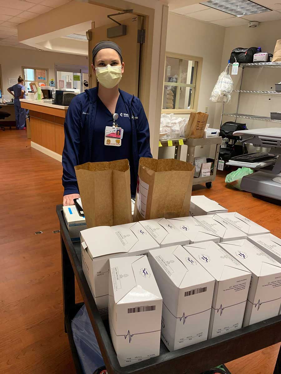 Shannon O’Day, a Neonatal Intensive Care Unit nurse, stepped outside her regular duties to deliver appropriate quantities of personal protective equipment to several departments.